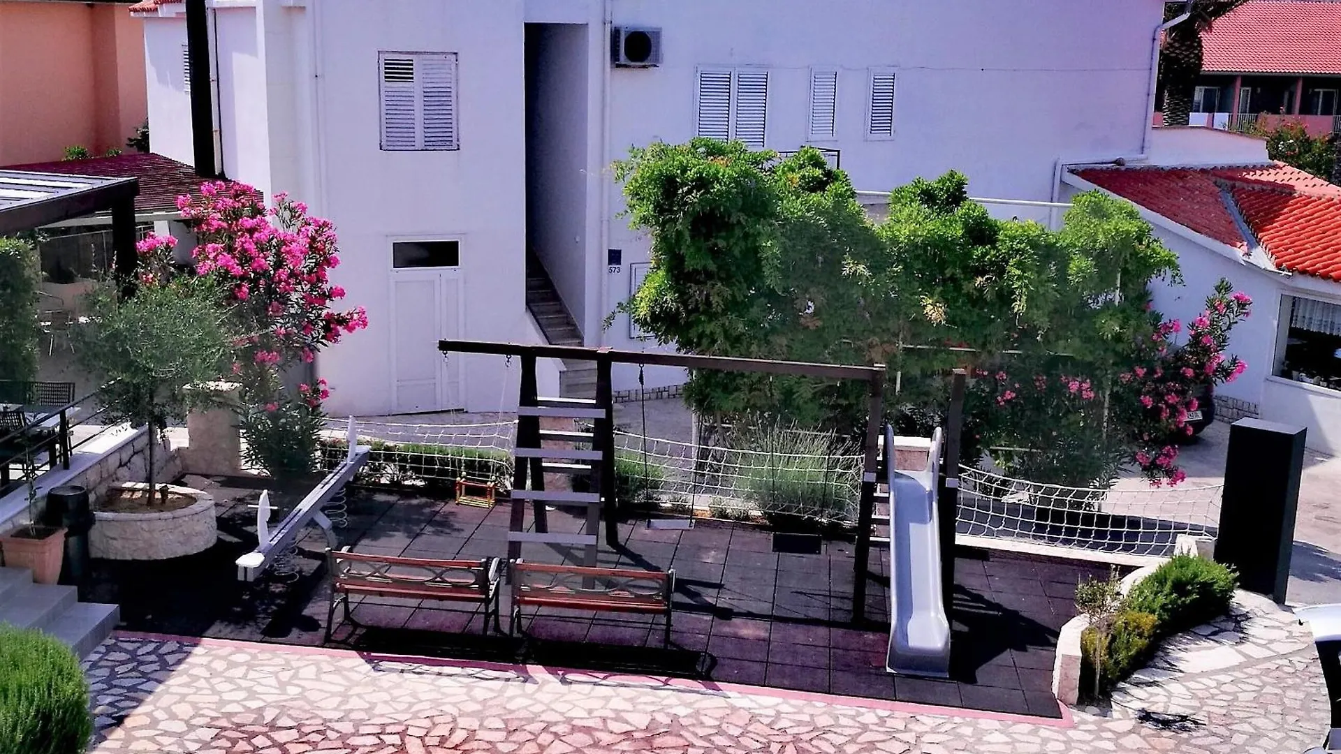 Apartmani Simon Lopar Vendégház
